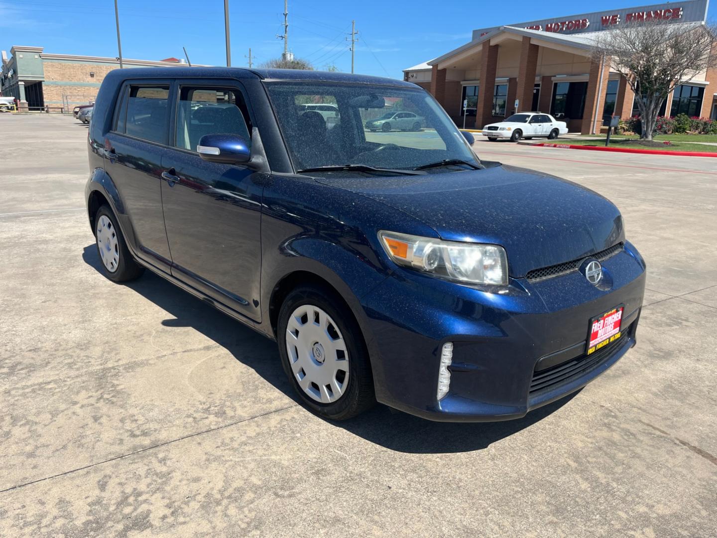 2014 blue /black Scion xB (JTLZE4FE1EJ) , Automatic transmission, located at 14700 Tomball Parkway 249, Houston, TX, 77086, (281) 444-2200, 29.928619, -95.504074 - Photo#0